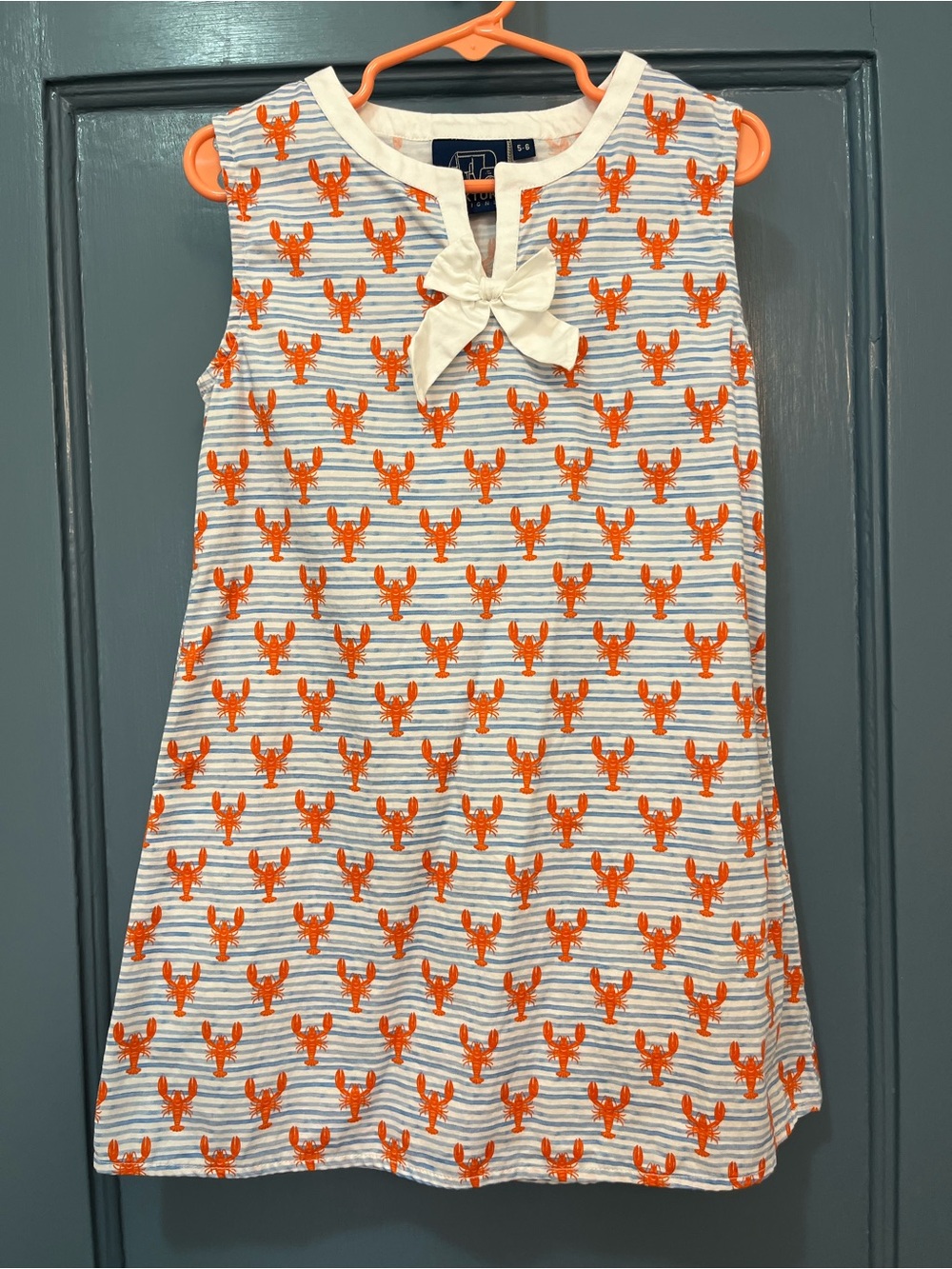 Sleeveless Striped Shift Dress with Orange Lobster Print and Cream Bow